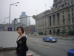 Miaomiao at the Bund area, with the HSBC Building, the China Merchants Bank Building and the Great Northern Telegraph Company Building