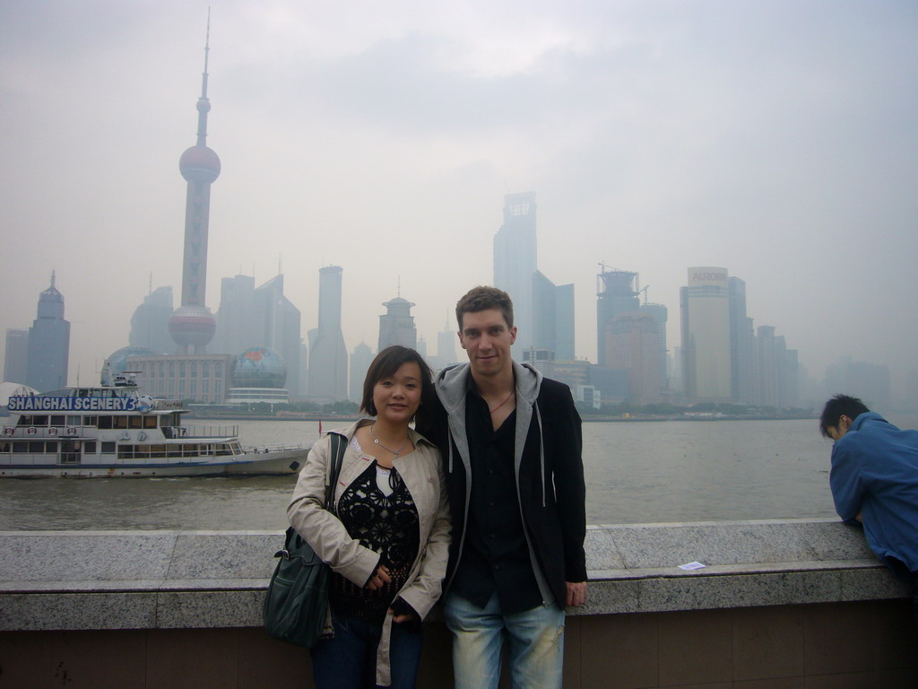 Tim, Miaomiao, Huangpu river and the skyline of the Pudong district, with the Oriental Pearl Tower