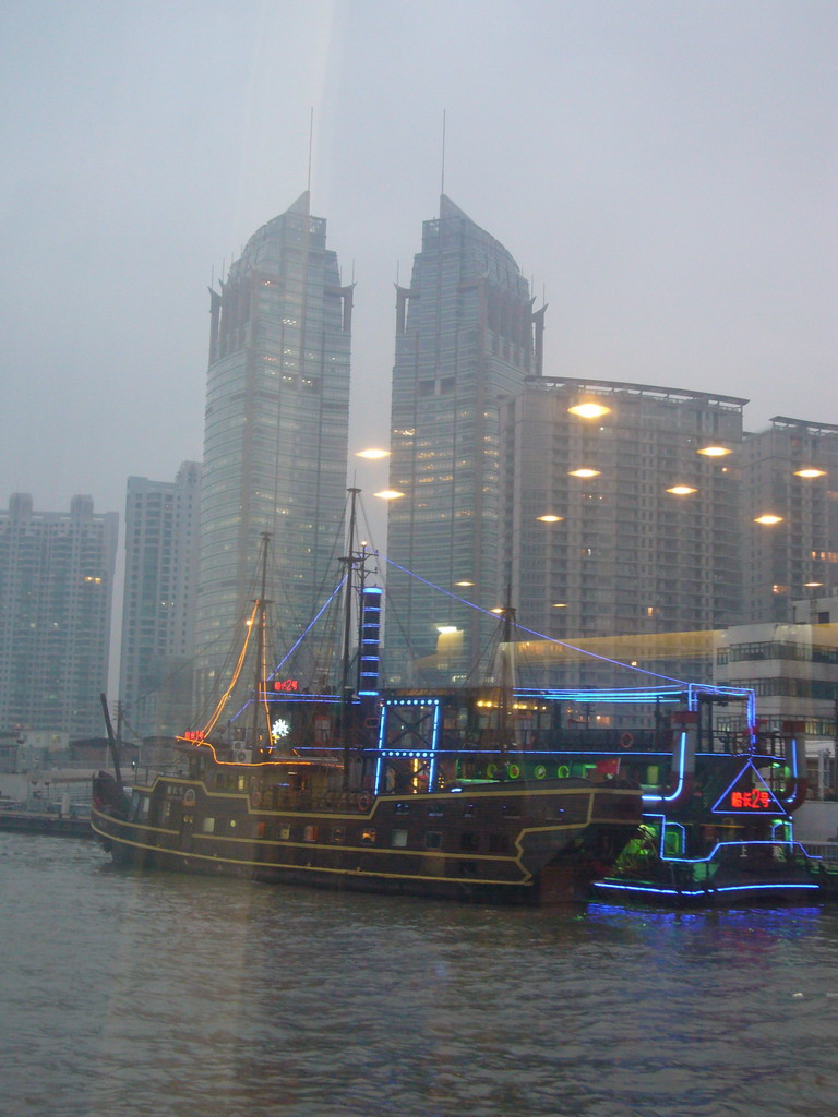 Huaxia Financial Square Towers and restaurant boat, viewed from the Huangpu river ferry