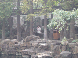 Miaomiao on a bench in the Yuyuan Garden in the Old Town