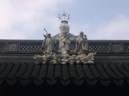 Statues at the roof of the Temple of the Town Gods in the Old Town