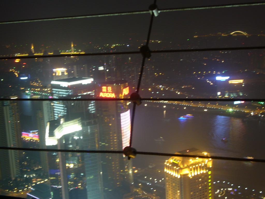 View on the Aurora Building, the Pudong Shangri-la Hotel, the Shanghai International Finance Center and other skyscrapers, from the top of the Oriental Pearl Tower, by night