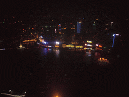 View on the northern part of the Huangpu river and surroundings, with the Monument to the People`s Heroes at Huangpu Park, the Hyatt on the Bund and other skyscrapers, from the top of the Oriental Pearl Tower, by night