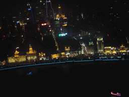 View on the Puxi skyline and the Bund area, with Tomorrow Square, Le Royal Méridien Shanghai and other skyscrapers, from the top of the Oriental Pearl Tower, by night