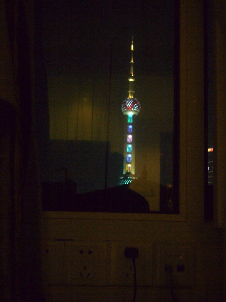 The Oriental Pearl Tower, viewed from our room in the Ambassador Hotel, by night