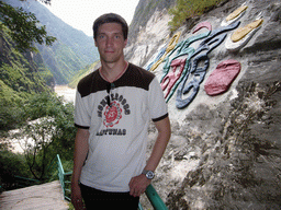Tim at inscriptions in a local language, at Tiger Leaping Gorge