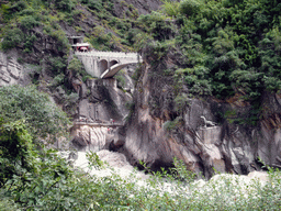 Bridge and tiger statue at Tiger Leaping Gorge