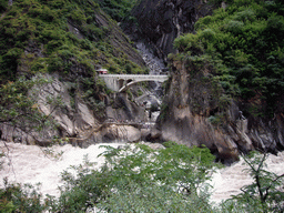 Bridge and tiger statue at Tiger Leaping Gorge