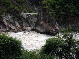 Bridge and tiger statue at Tiger Leaping Gorge