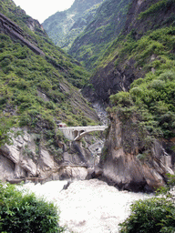 Bridge and tiger statue at Tiger Leaping Gorge
