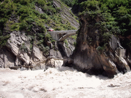 Bridge and tiger statue at Tiger Leaping Gorge