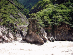 Bridge and tiger statue at Tiger Leaping Gorge