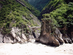 Bridge and tiger statue at Tiger Leaping Gorge