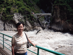 Miaomiao`s mother and the bridge at Tiger Leaping Gorge