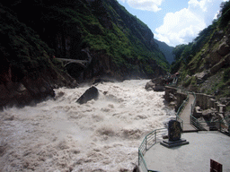 Rapids, bridge and track at Tiger Leaping Gorge