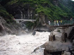 Rapids, bridge and track at Tiger Leaping Gorge