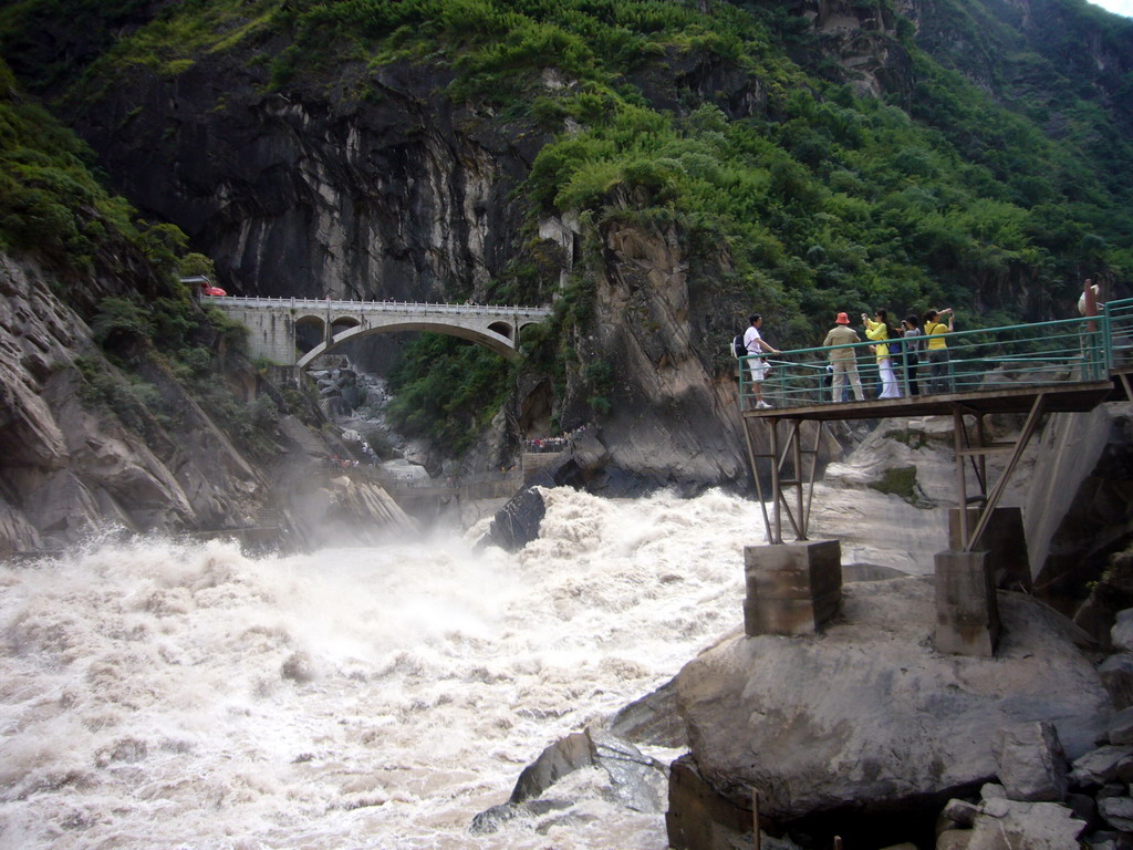 Rapids, bridge and track at Tiger Leaping Gorge