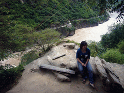 Miaomiao taking a rest at the track going up from Tiger Leaping Gorge
