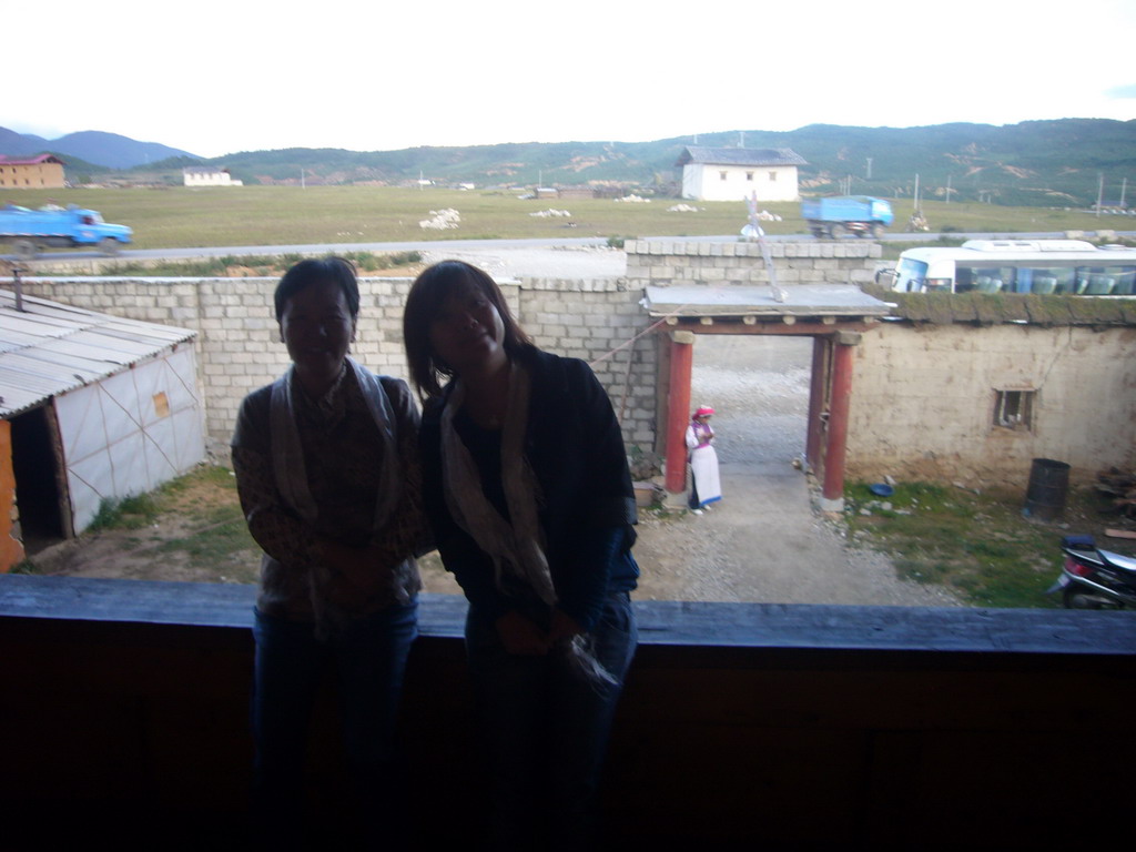 Miaomiao and Miaomiao`s mother at the entrance of our Tibetan dinner house