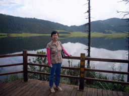 Miaomiao`s mother at Shudu Lake in Potatso National Park