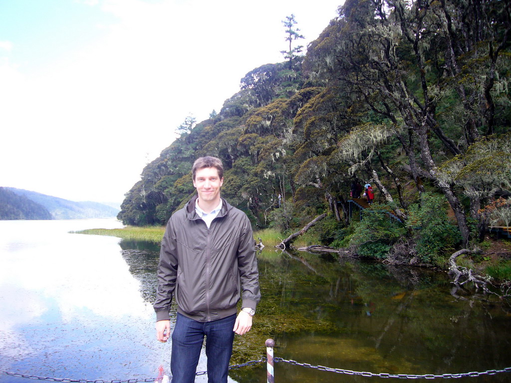 Tim at waterside of Bita Lake in Potatso National Park