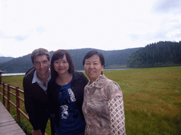 Tim, Miaomiao and Miaomiao`s mother at Bita Lake in Potatso National Park