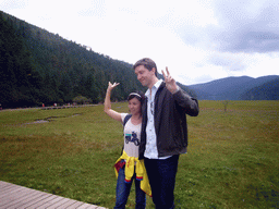 Tim and a Chinese girl at grassland in Potatso National Park