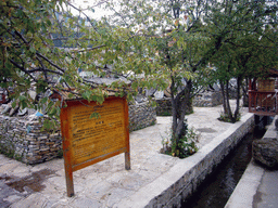 Mani piles with explanation at Tibetan buddhism temple near Shangri-La