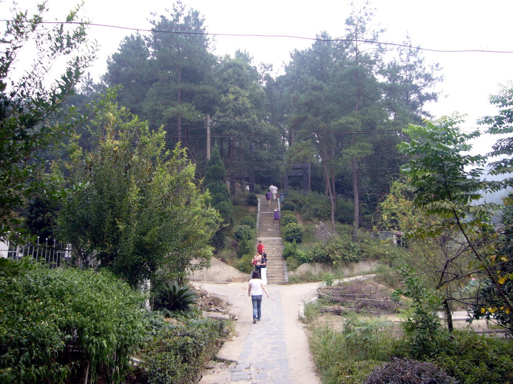 Miaomiao on the path to the tomb of Mao Zedong`s parents