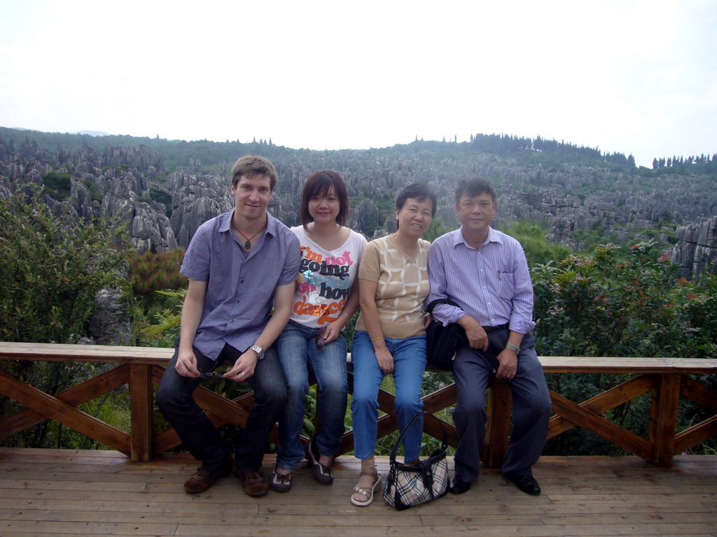 Tim, Miaomiao and Miaomiao`s parents at karst formations in the Minor Stone Forest of Shilin National Park