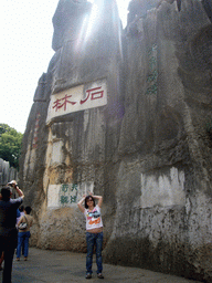 Miaomiao at karst formations in the Major Stone Forest of Shilin National Park