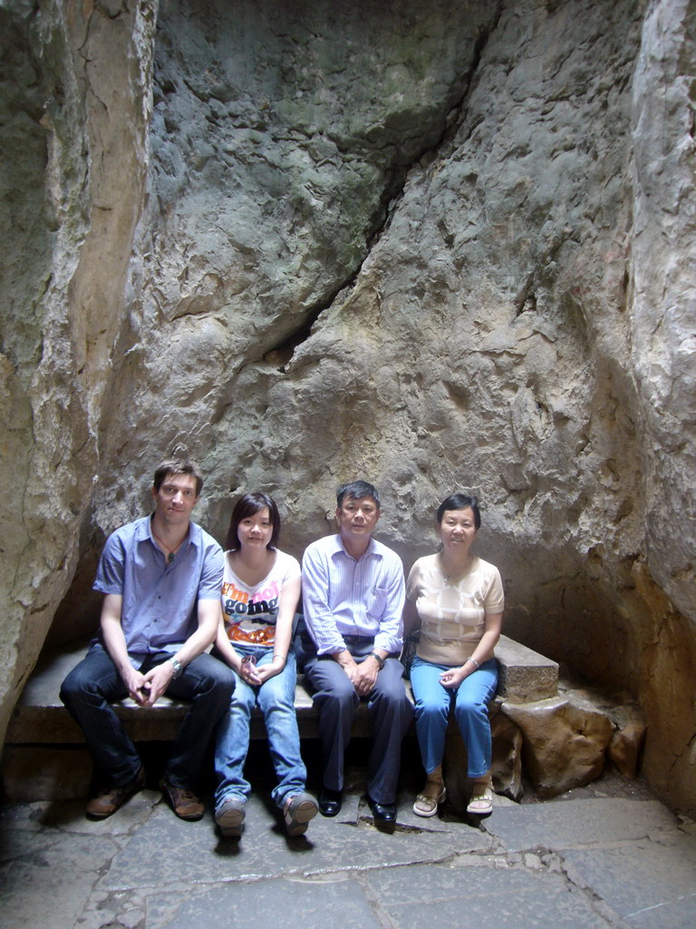 Tim, Miaomiao and Miaomiao`s parents on a bench in the Major Stone Forest of Shilin National Park