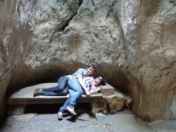 Tim and Miaomiao on a bench in the Major Stone Forest of Shilin National Park