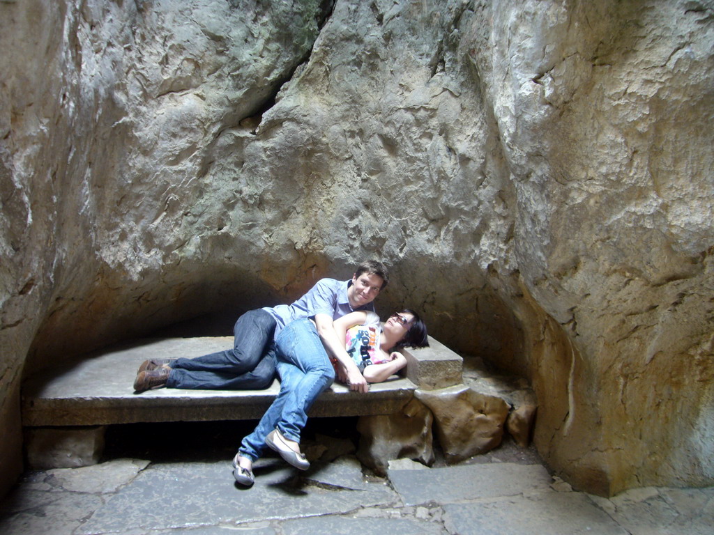 Tim and Miaomiao on a bench in the Major Stone Forest of Shilin National Park