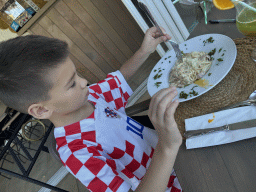 Max eating Spaghetti Carbonara at Conny`s Restaurant