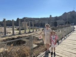 Miaomiao and Max at the Liman Caddesi street, with a view on the Trade Agora and the Roman Theatre of Side