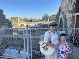 Miaomiao and Max at the Liman Caddesi street, with a view on the Trade Agora and the Latrina of the Trade Agora and the Roman Theatre of Side