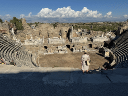 Miaomiao at the southwest auditorium of the Roman Theatre of Side, with a view on the auditorium, orchestra, stage and stage building