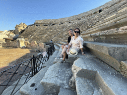 Tim and Miaomiao at the bottom of the southwest auditorium of the Roman Theatre of Side, with a view on the orchestra