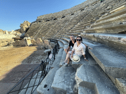 Tim and Miaomiao at the bottom of the southwest auditorium of the Roman Theatre of Side, with a view on the orchestra