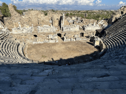 Tim and Max at the bottom of the southwest auditorium of the Roman Theatre of Side, with a view on the orchestra, stage and stage building, viewed from the diazoma