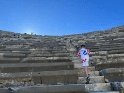 Max climbing to Miaomiao at the diazoma of the southwest auditorium of the Roman Theatre of Side, viewed from the bottom
