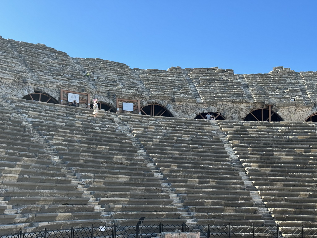 Miaomiao and Max at the diazoma of the southwest auditorium of the Roman Theatre of Side, viewed from the southeast auditorium