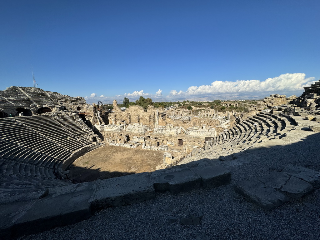 Auditorium, orchestra, stage and stage building of the Roman Theatre of Side and the Trade Agora, viewed from the diazoma of the south auditorium