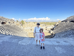 Miaomiao and Max at the diazoma of the southwest auditorium of the Roman Theatre of Side, with a view on the auditorium, orchestra, stage and stage building
