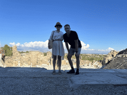 Tim and Miaomiao at the diazoma of the southwest auditorium of the Roman Theatre of Side, with a view on the auditorium and stage building