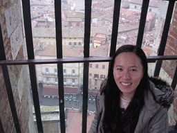 Miaomiao`s friend at the top of the Tower of Mangia, with a view on the Piazza del Campo square with the Gaia Fountain and the Loggia della Mercanzia building