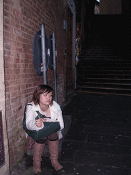 Miaomiao in front of a staircase near the Piazza del Duomo square