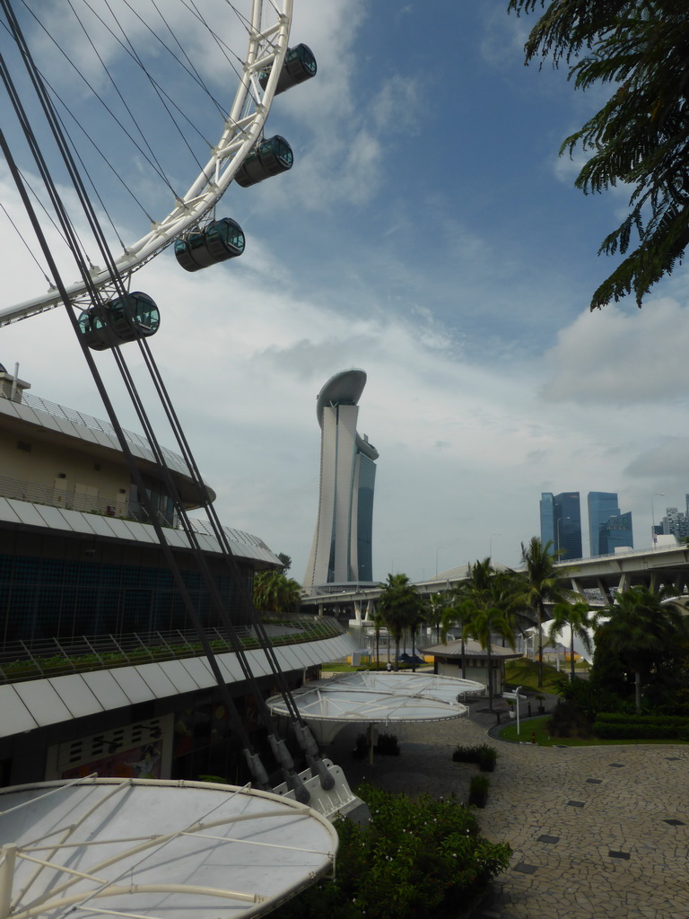 Southwest part of the Singapore Flyer ferris wheel and the Marina Bay Sands building, viewed from a walkway to the Singapore Flyer ferris wheel