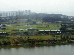 The Marina Bay Golf Course and skyscrapers at the east side of the city, viewed from the Singapore Flyer ferris wheel